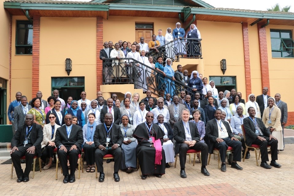 Group of clergy and lay participants of the regional convening gather for a formal photo.  
